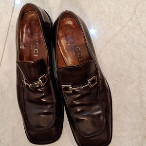 Brown Gucci men's shoes.